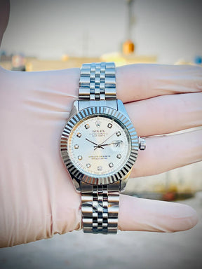 Rolex watch white dial with diamonds and date